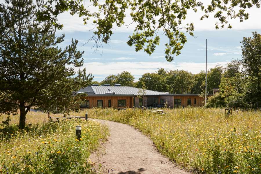 Homes and facilities for autistic residents, clad in wood and steel profiles, and surrounded by forest, AutismeCenter Skive, Jægervej 16, 7800 Skive